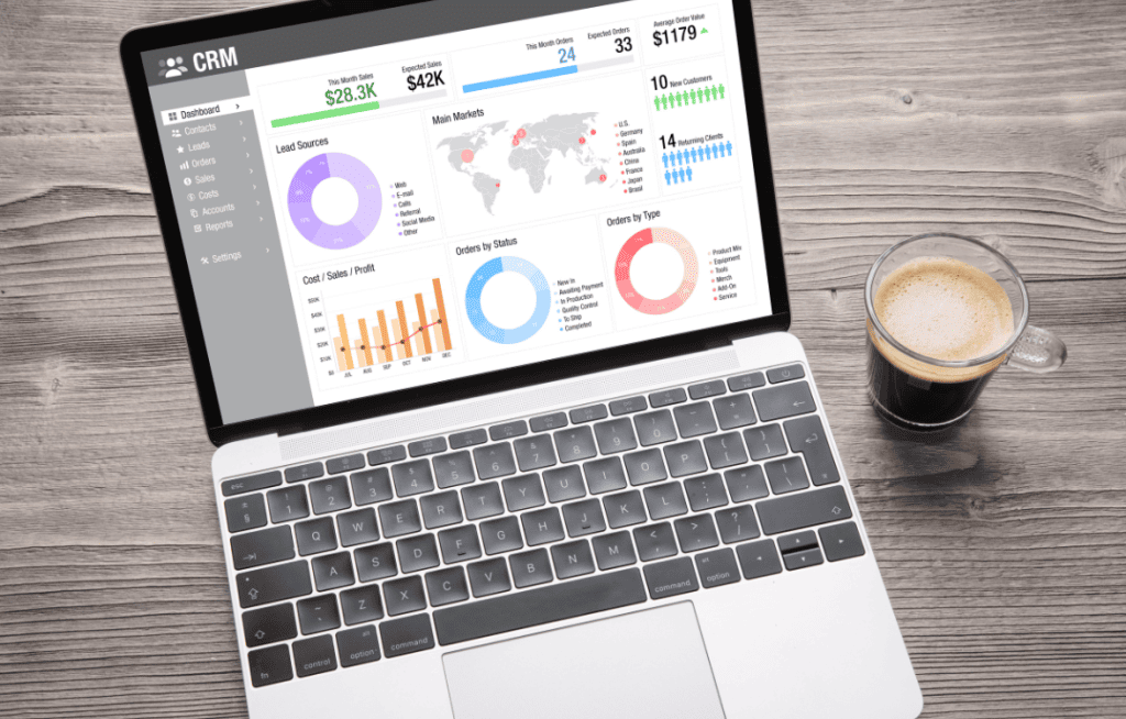 computer with a CRM dashboard on it
